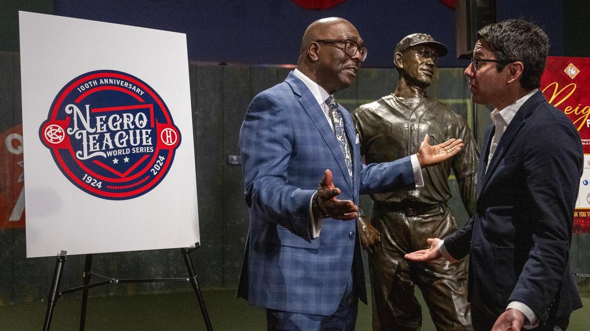 After unveiling a new logo to commemorate the 100th anniversary of the first Negro Leagues World Series, Bob Kendrick, president of the Negro League Baseball Museum, talks with Luis Maes, Vice President of Community Impact for the Royals, on Wednesday, Feb. 21, 2024, at the Negro Leagues Baseball Museum in Kansas City. The first Negro Leagues World Series was played between the Kansas City Monarchs and the Hilldale Club of Darby, Pennsylvania, in 1924.