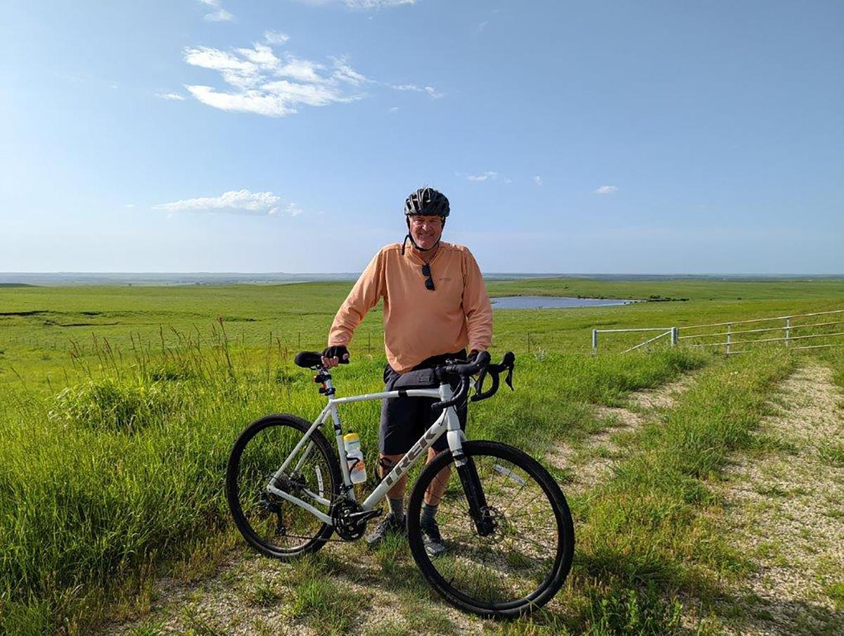Wednesday-Matt Keenan took a break for a photo along Hwy. 150 as the Biking across Kansas group rode through the Flint Hills.