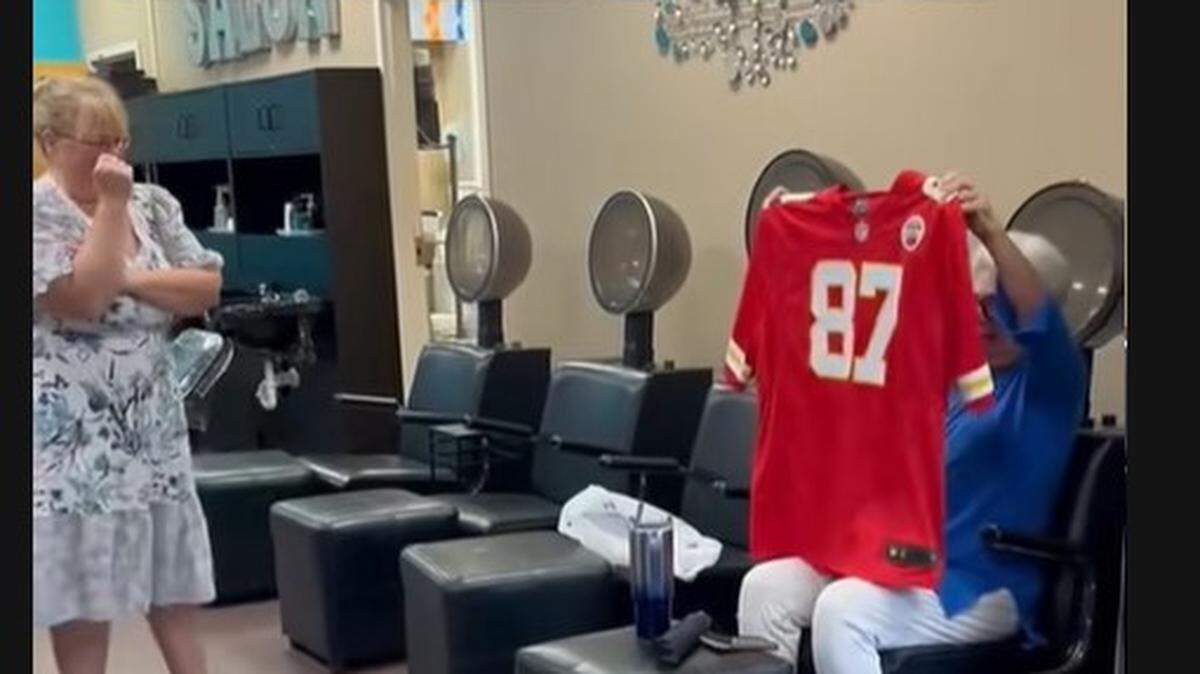This Chiefs fan was over the moon about getting a signed Travis Kelce jersey.
