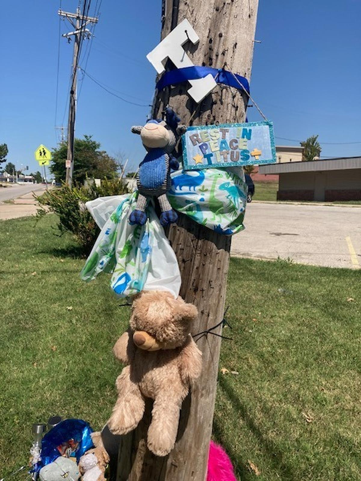 A memorial to 3-year-old Tidus Bass was erected across the street from Independence Towers in Independence. The child fell from a window in his eighth floor apartment on July 29, 2024.