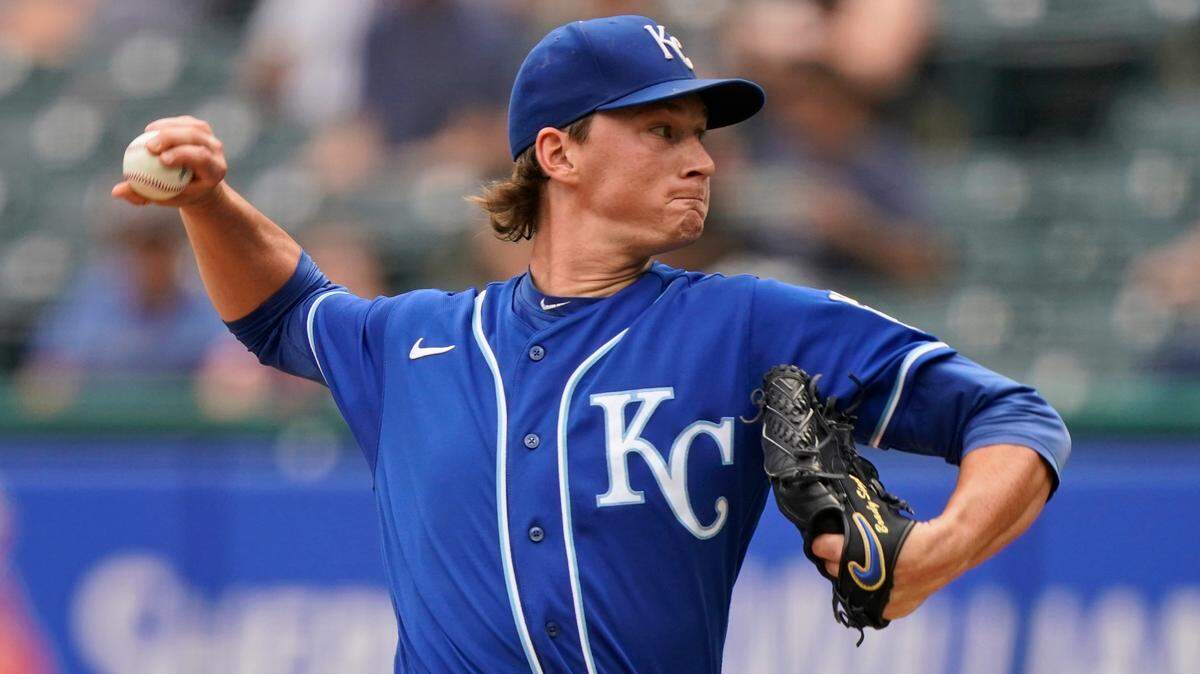 Kansas City Royals starting pitcher Brady Singer delivers in the first inning in the first baseball game of a doubleheader against the Cleveland Indians, Monday, Sept. 20, 2021, in Cleveland. (AP Photo/Tony Dejak)