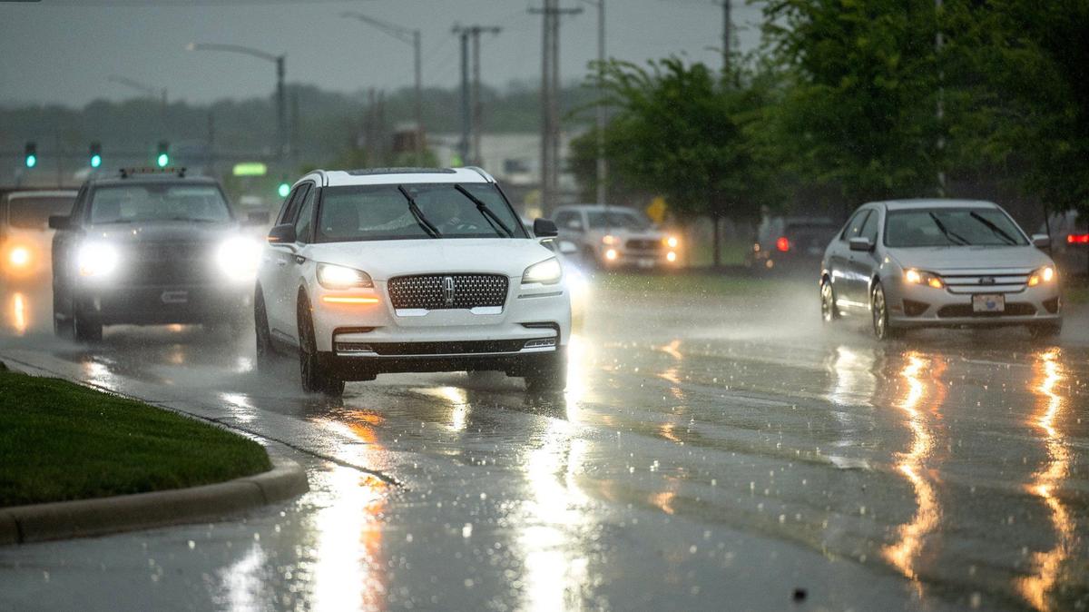 Drivers navigated Shawnee Mission Parkway in heavy rain and dark skies as the first of a series of storms moved through the Shawnee and the Kansas City area on Thursday. More than two inches of rain from the storms was reported in parts of the metro.