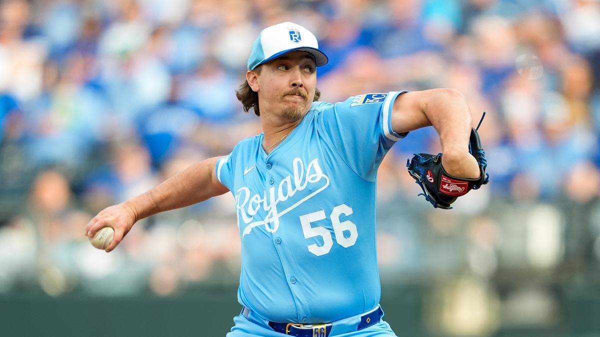 Kansas City Royals relief pitcher Hunter Harvey (56) pitches during the eighth inning against the Cleveland Guardians at Kauffman Stadium on March 27, 2025.