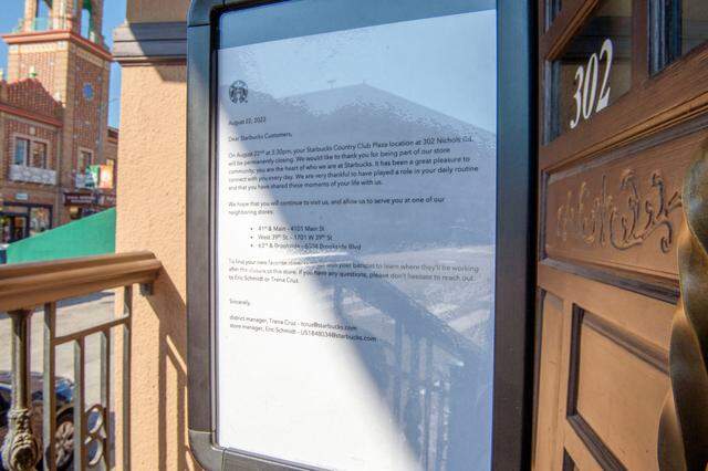 A sign posted at the Starbucks location on the Country Club Plaza Tuesday notified employees and visitors that the location had permanently closed.