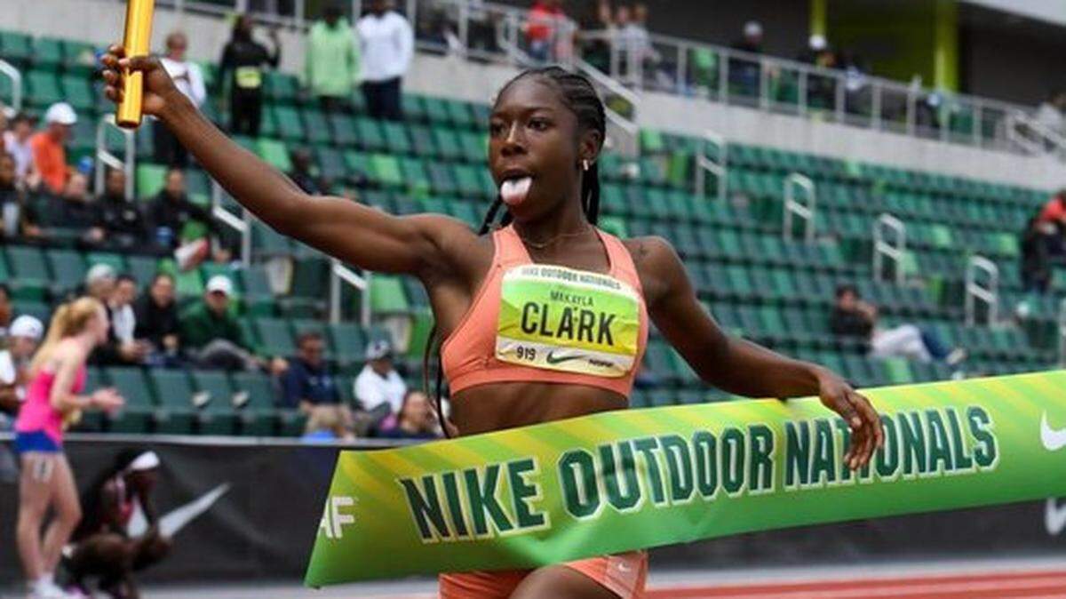 Lee’s Summit West runner Makayla Clark celebrates as she crosses the finish line in first at the Nike Outdoor Nationals in Eugene, Oregon. She anchored the final leg of the team’s first place sprint medley relay.