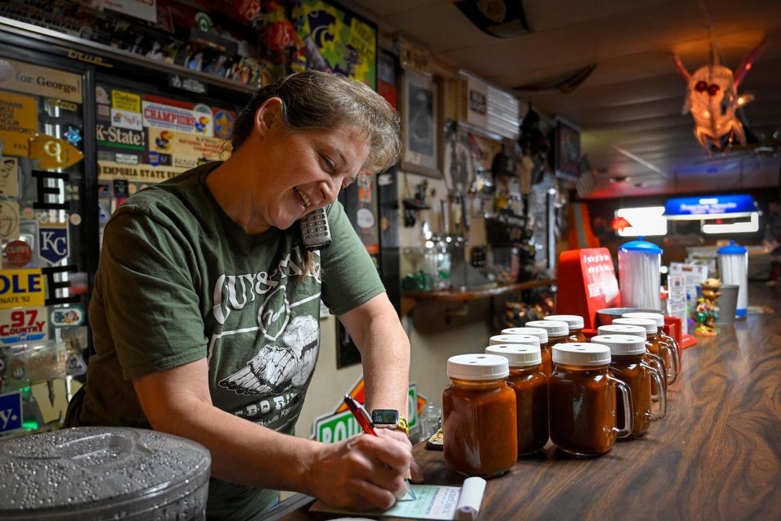 Owner Lori Thompson takes a call-in order at Guy & Mae’s Tavern, a barbecue joint opened by her grandparents, Guy and Mae Kesner, in 1973 in Williamsburg, Kansas. The tavern will celebrate its 50th anniversary next year.