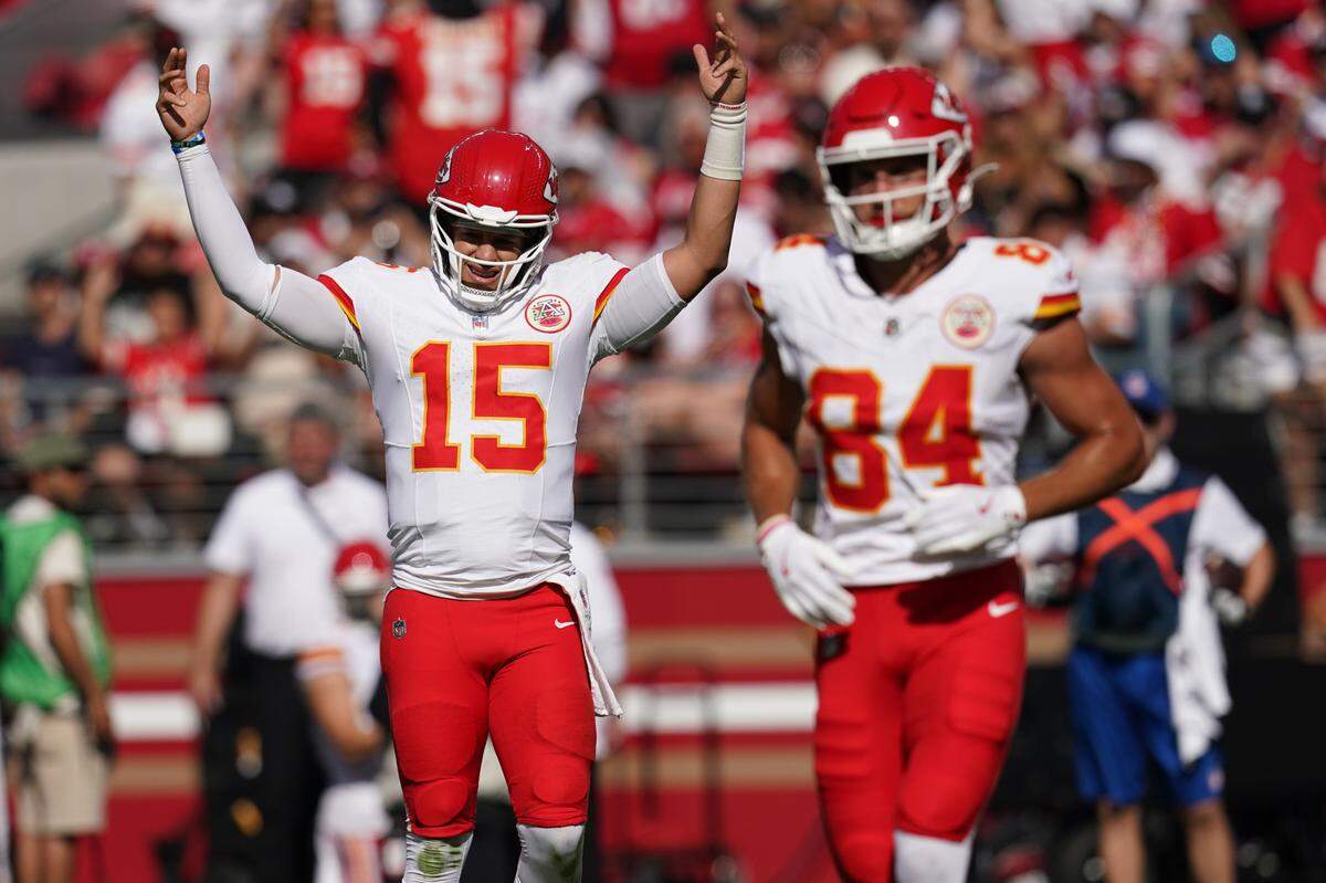 Kansas City Chiefs quarterback Patrick Mahomes (15) reacts after the Chiefs scored a touchdown against the San Francisco 49ers in the second quarter at Levi’s Stadium.