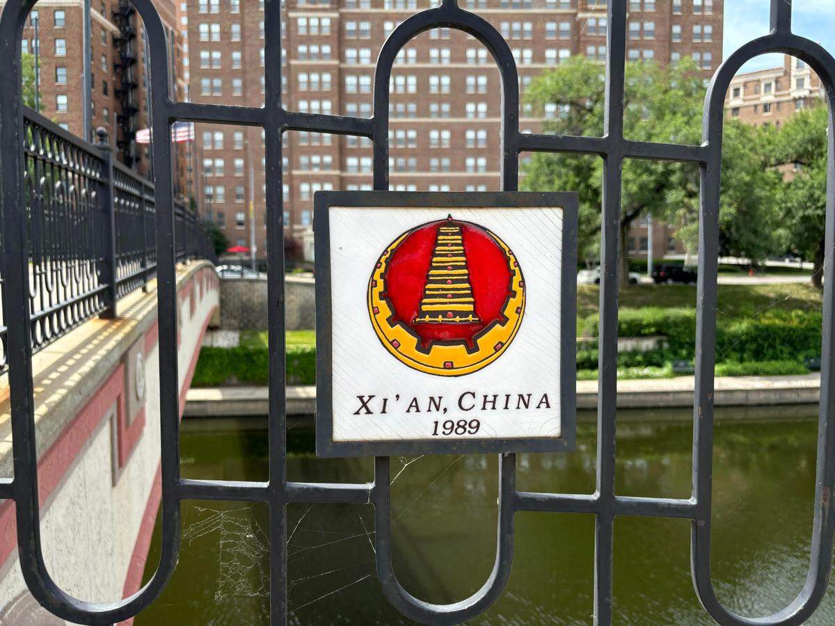 A medallion representing Xi’an, China, decorates Kansas City’s Sister Cities International Bridge, which spans Brush Creek on the Plaza. Two terracotta warrior statues given by the city were vandalized multiple times in their first year in Missouri.