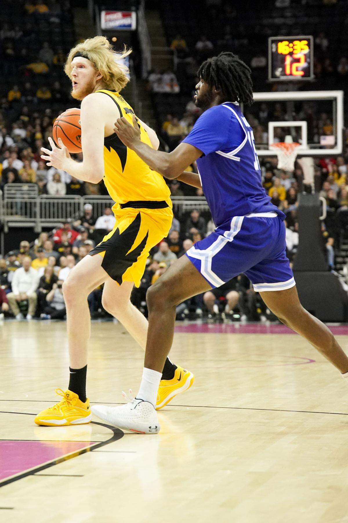 Seton Hall big man Jaden Bediako defends Missouri Tigers center Connor Vanover during Sunday afternoon’s game at T-Mobile Center in Kansas City.