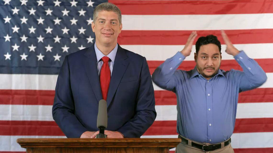 A screenshot of a video advertisement for Sen. Bill Eigel, left, a Republican candidate for governor in Missouri, shows a Spanish-speaking interpreter reacting to Eigel.