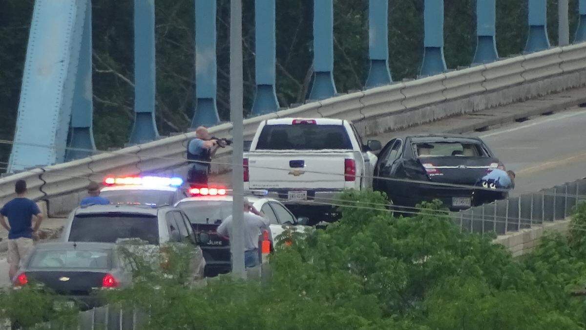 A bystander took photos of the scene Wednesday on the Centennial Bridge, where a shooting was reported to Leavenworth police. The bridge connects Leavenworth, Kansas, to Platte County over the Missouri River.