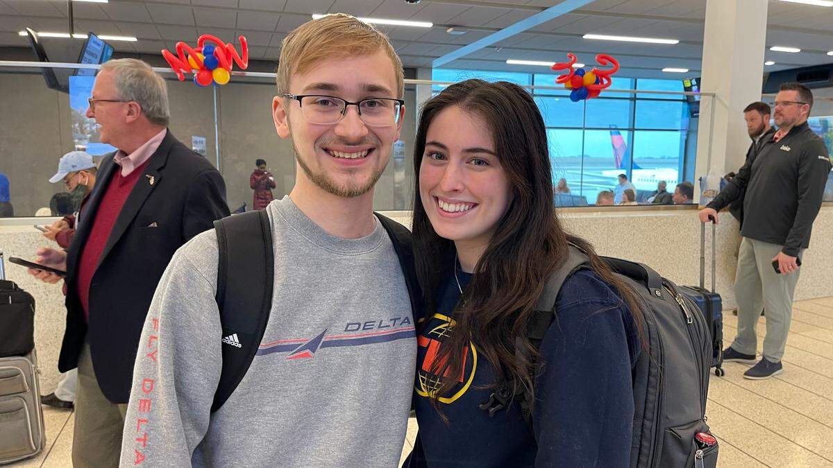 Haylie Hensley and her boyfriend Ashton Liberty from Kansas City flew out on the last flight leaving the old terminals Monday, and returned on the first flight to the new terminal.
