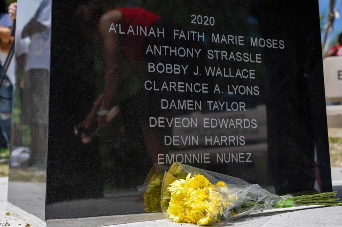 Names of children who died in 2020 are engraved on the Children’s Memorial at Hibbs Park on Thursday, May 15, 2025, in Kansas City. The memorial includes names submitted by families and community members, honoring children lost to violence between 2001 and 2024.