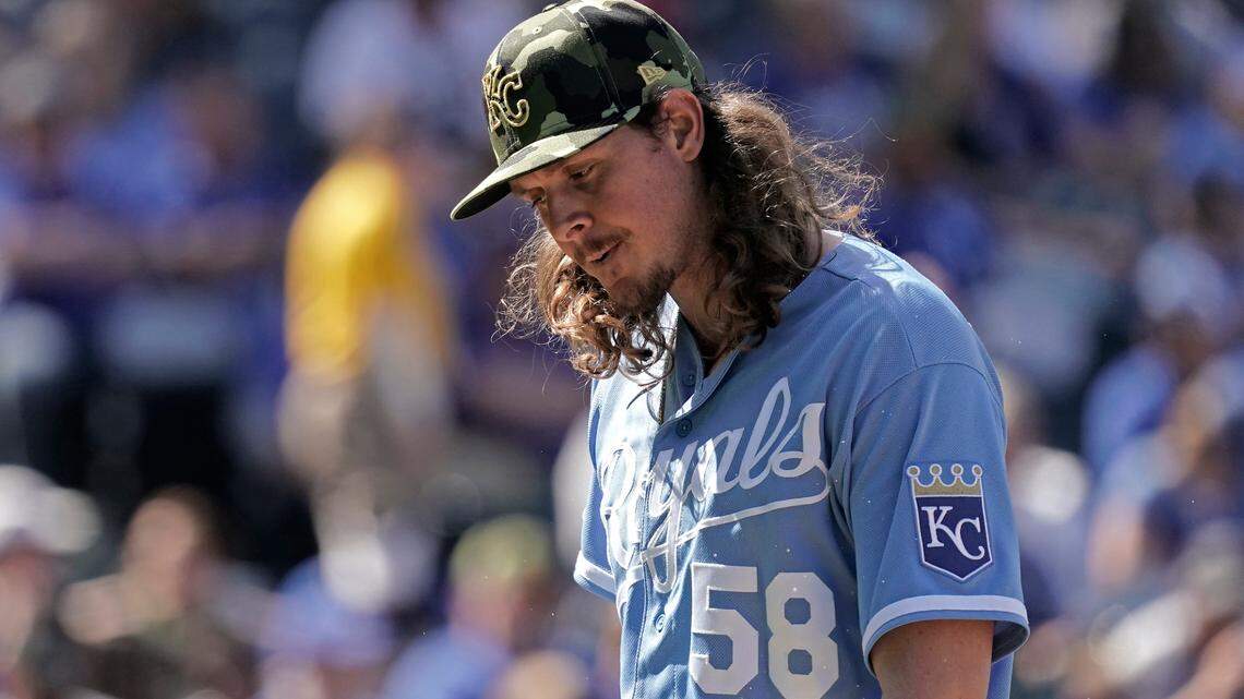 Kansas City Royals relief pitcher Scott Barlow walks to the dugout after being relieved during the eighth inning of a baseball game against the Minnesota Twins Sunday, May 22, 2022, in Kansas City, Mo. (AP Photo/Charlie Riedel)