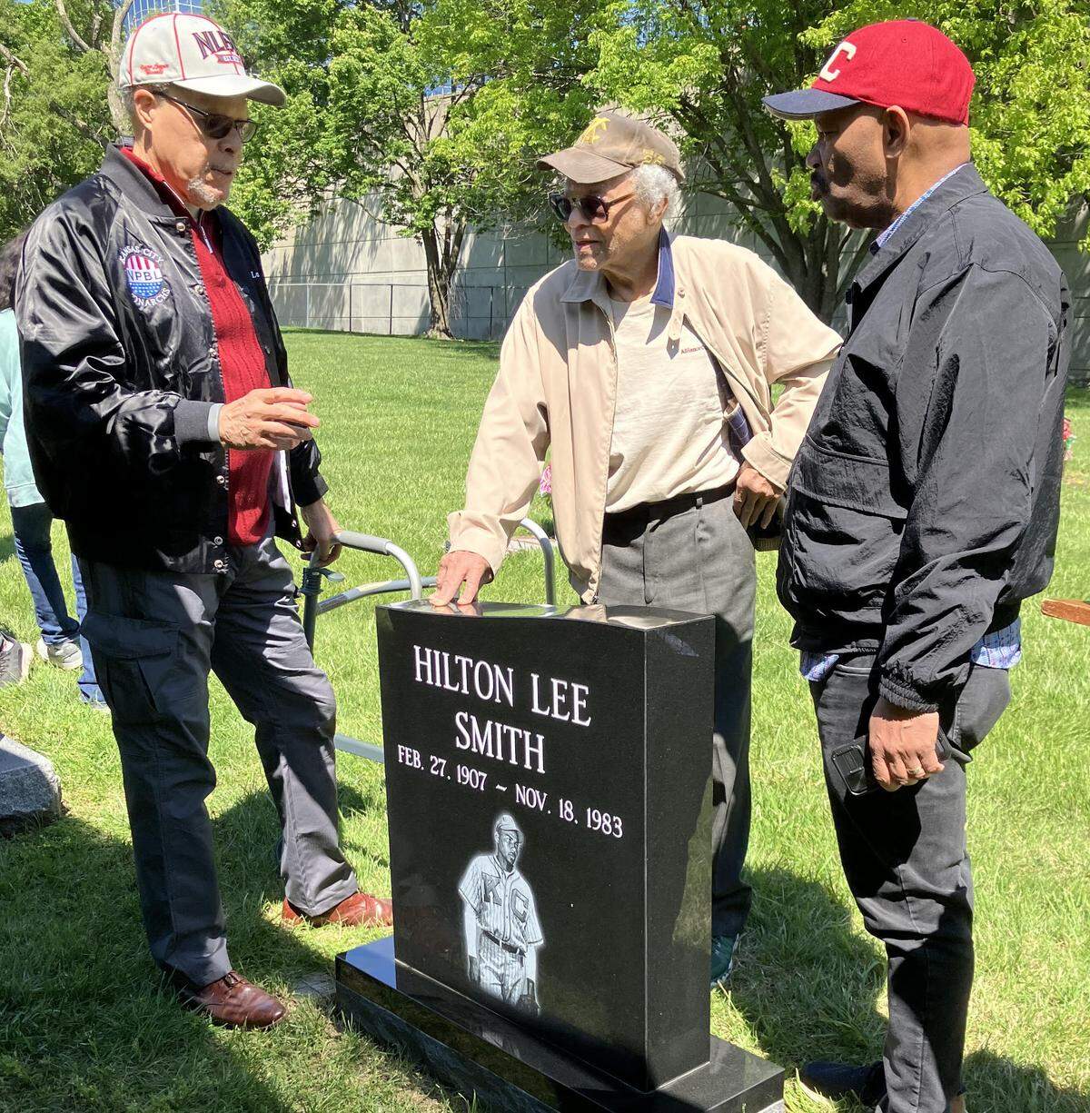 Among those gathered for a small ceremony commemorating a new grave marker for Negro Leagues great and National Baseball Hall of Famer Hilton Smith at Mt. Moriah Cemetery in Kansas City on Friday, May 1, 2026, were Smith’s son DeMorris (middle) and Negro Leagues historians Larry Lester (left) and Phil S. Dixon.