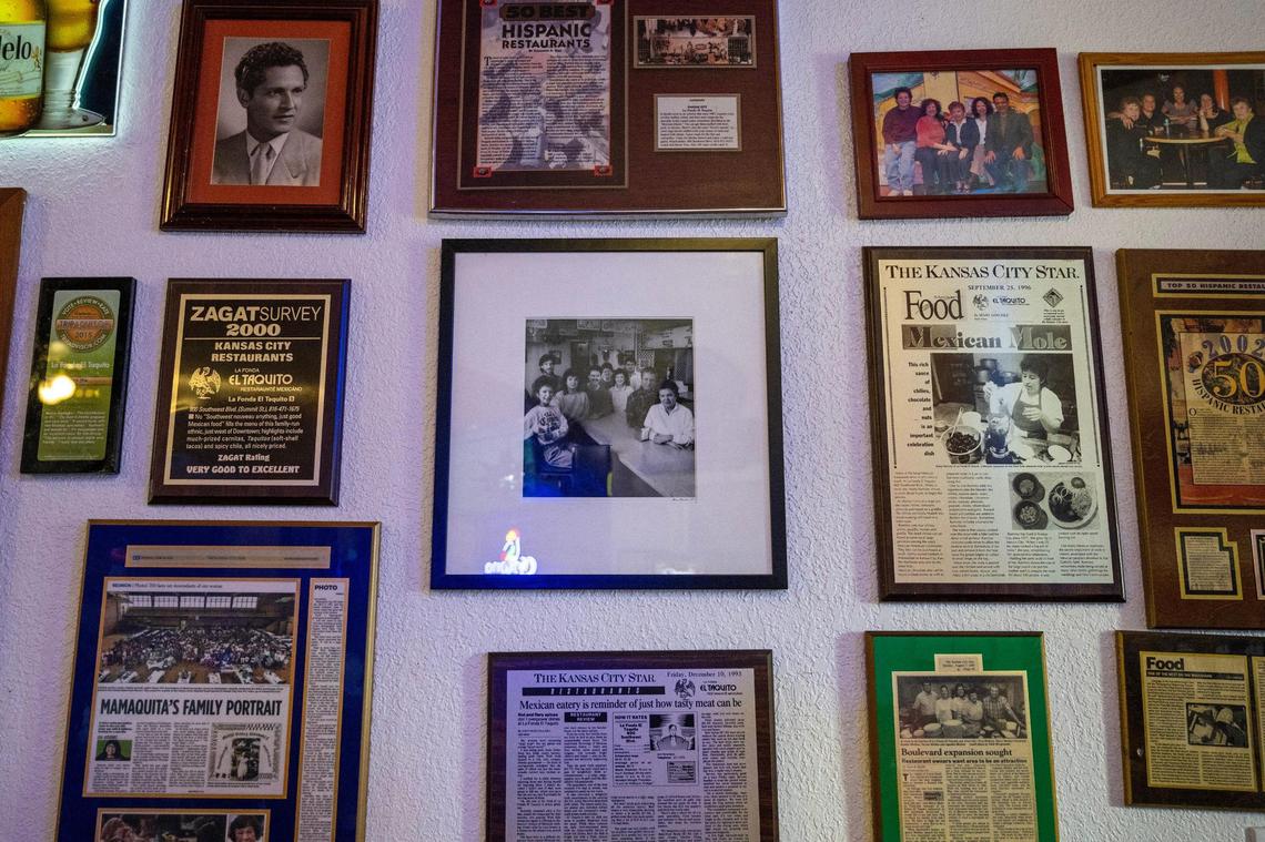 A collection of newspaper clippings and family photos are displayed along a wall at La Fonda El Taquito in Kansas City. It’s been a Kansas City establishment for 40 years.