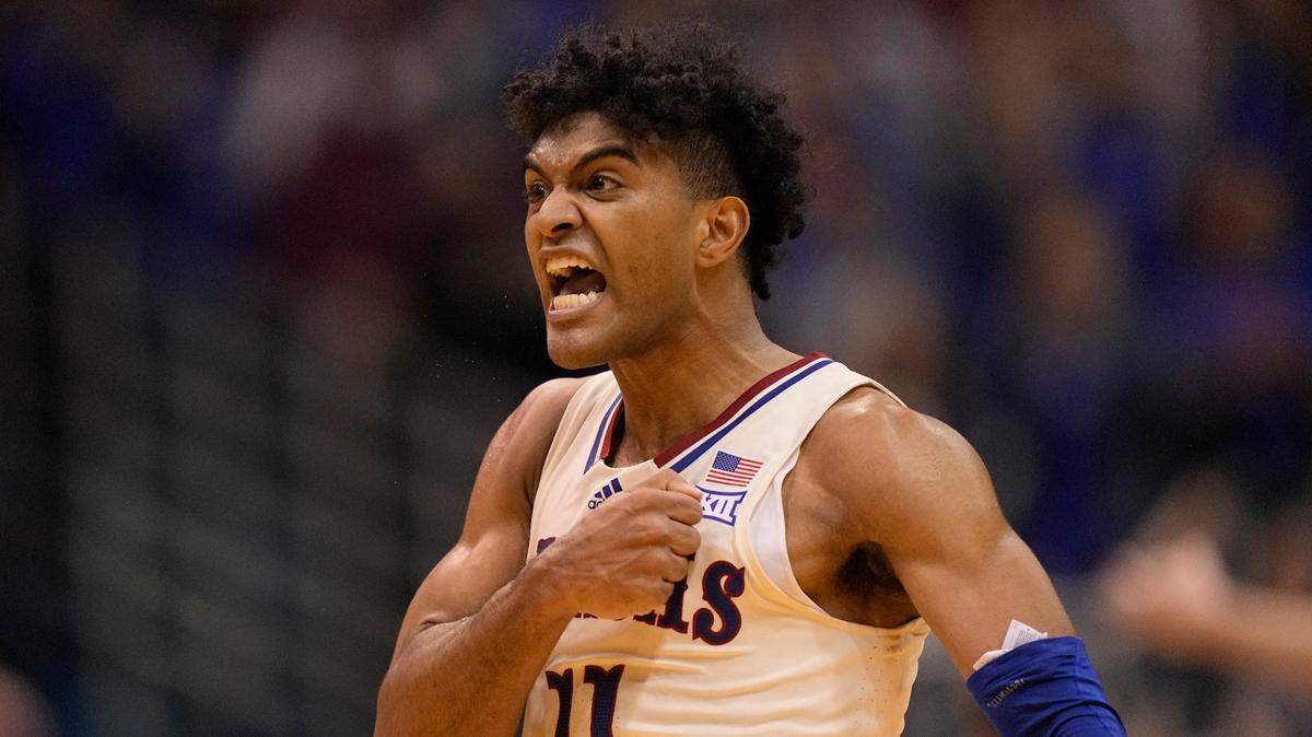 Kansas’ Remy Martin celebrates after making a basket during the second half against Stephen F. Austin on Saturday, Dec. 18, 2021, in Lawrence.