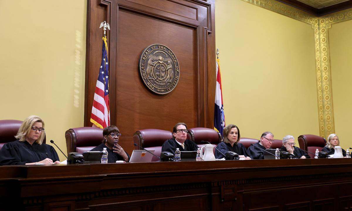 The Missouri Supreme Court takes the bench on Tuesday, Sept. 10, 2024 in Jefferson City to hear a case questioning whether an amendment to overturn the states abortion ban will remain on the states November ballot. From left are Judges Kelly C. Broniec, Robin Ransom, W. Brent Powell, Chief Justice Mary R. Russell, Zel. M. Fischer, Paul C. Wilson and Ginger K. Gooch.