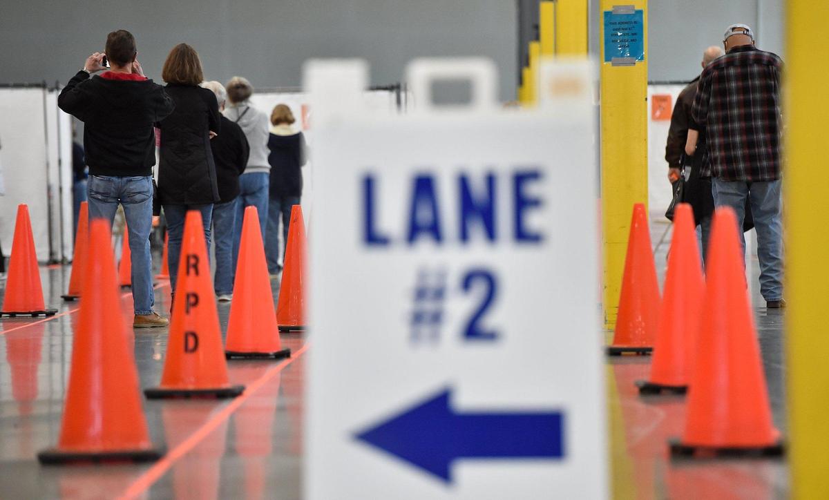 People lined up to receive the COVID-19 vaccine at a Platte County Health Department mass vaccination clinic in Riverside earlier this month. Other Kansas Citians eager to get vaccinated are finding alternative ways to get a shot.