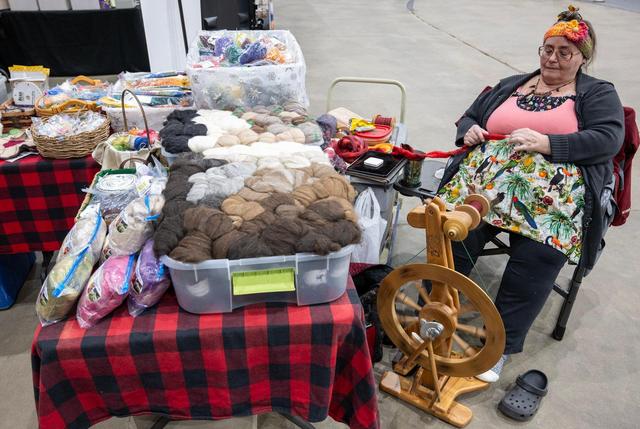 “It’s very calming for me because I love it and I’m a master spinner and I just love the constant movement and the ability to draft and make the yarn exactly like I like it,” said Lorry McDonald of Oak Grove, Missouri, who was spinning alpaca wool into yarn at her booth, Black Water Treasures, at the MOPACA Invitational Alpaca Show 2024 Friday at Hale Arena. “I went to the Alberta College of Agriculture and they have a master spinner class up there and you learn all about the types of yarn and you do sheep and all kinds of animals and plant proteins along with alpaca and llama and the camelids,” said McDonald. “And you also learn about how to decide how much yarn you need for sweaters or scarves or all that stuff.”