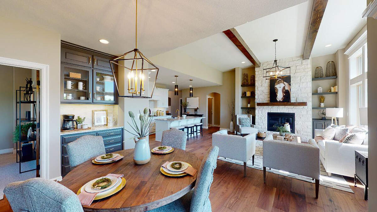 The Ellenbrook plan by SAB Homes is a popular reverse story-and-a-half layout, shown here in a previously completed home at Eagle Creek.