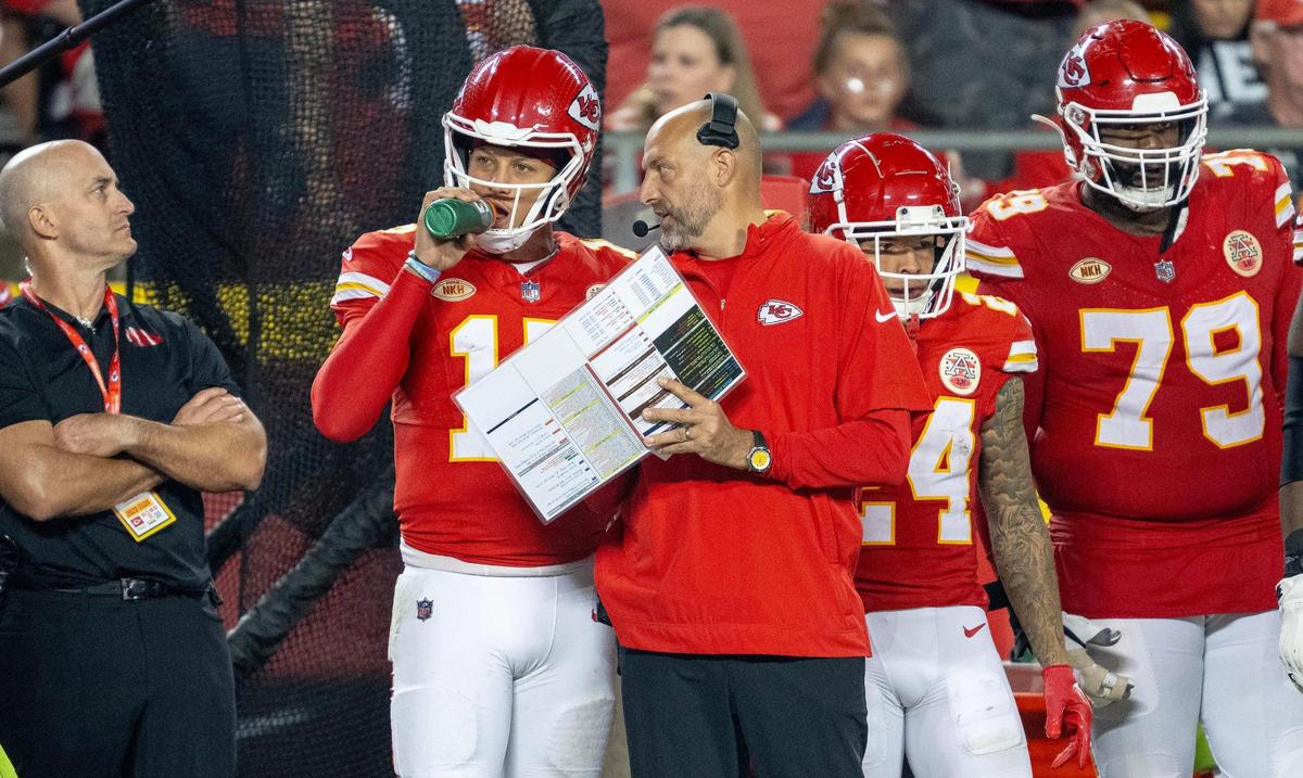 Kansas City Chiefs offensive coordinator Matt Nagy talks with quarterback Patrick Mahomes (15) during an NFL football game against the Detroit Lions on Thursday, Sept. 7, 2023, in Kansas City.