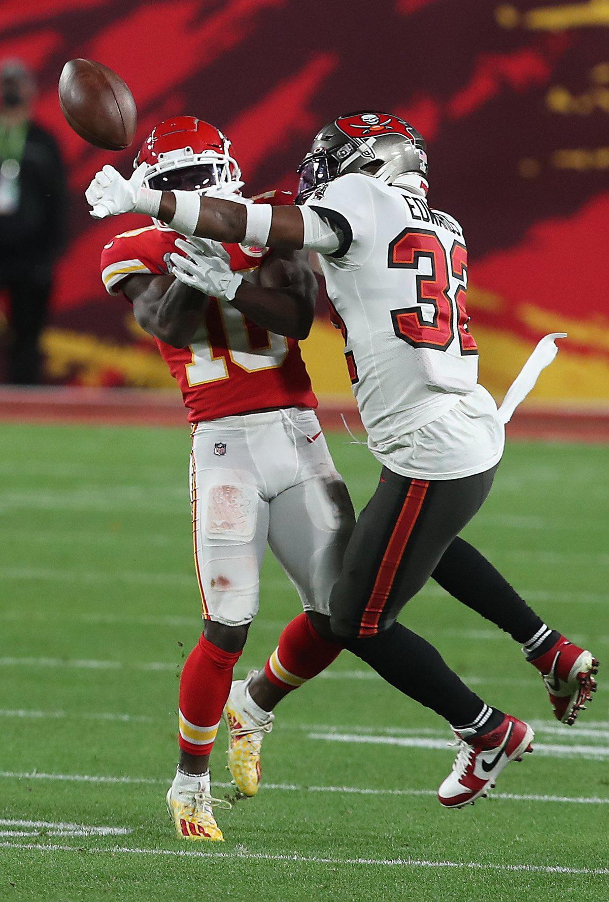 Tampa Bay Buccaneers safety Mike Edwards forced an interception when he knocked the ball away from Kansas City Chiefs wide receiver Tyreek Hill in the third quarter Sunday, February 7, 2021, at Super Bowl LV at Raymond James Stadium in Tampa, Florida.