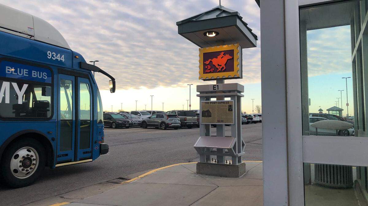 Some travelers were charged the wrong fees for parking in the Economy lot at Kansas City International Airport. In this file photo, a shuttle bus pulled up to a stand in Economy lot early on opening day for the new terminal last year.
