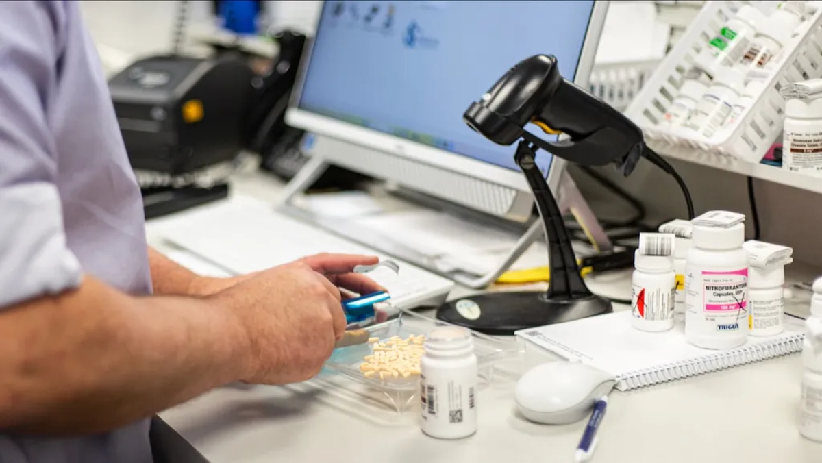 Community pharmacists are juggling filling prescriptions with a growing list of other duties.