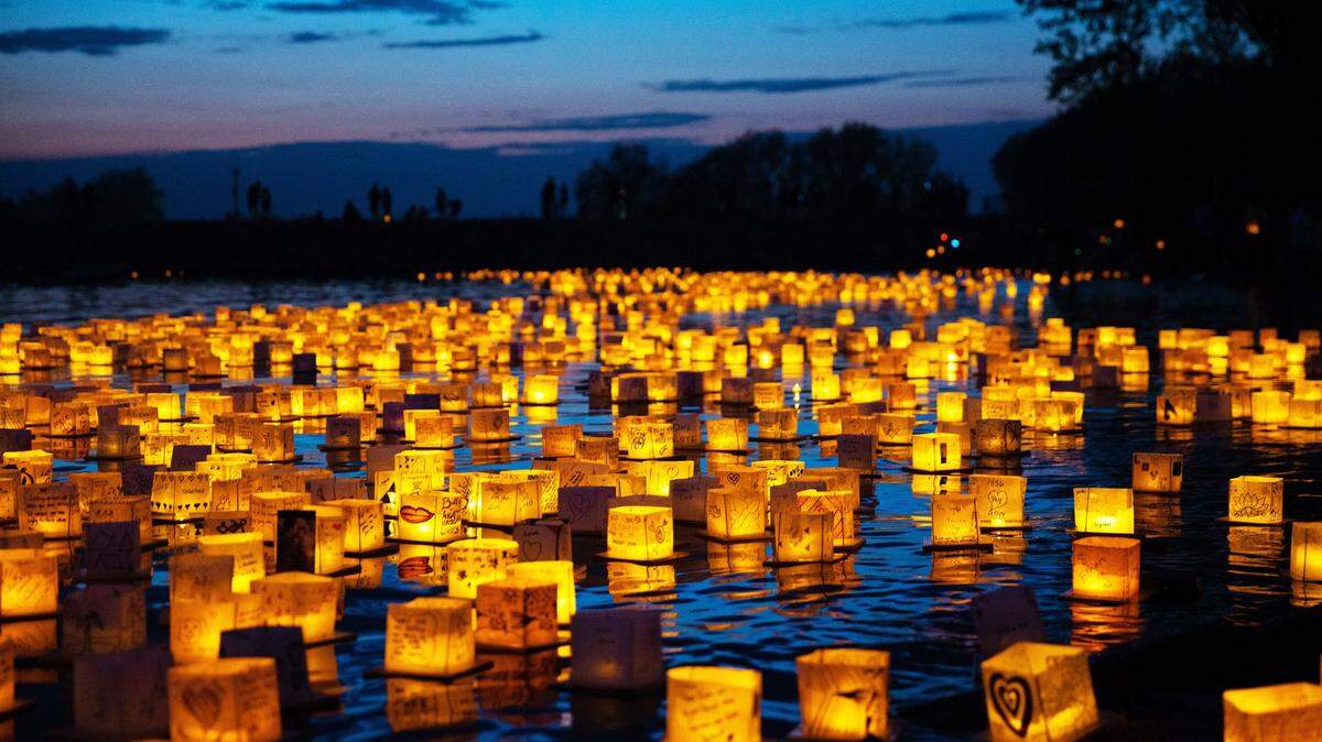 The Water Lantern Festival will light up the evening waters at Theis Park on July 23.