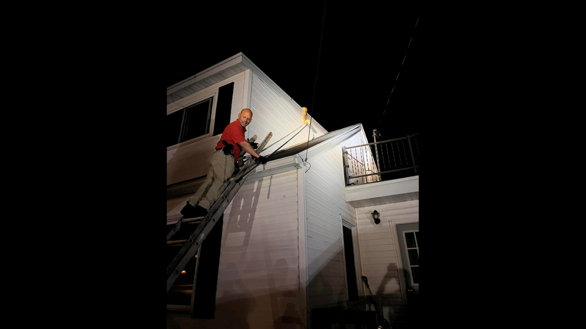 Deputies went up to the roof to capture the escaped pet.