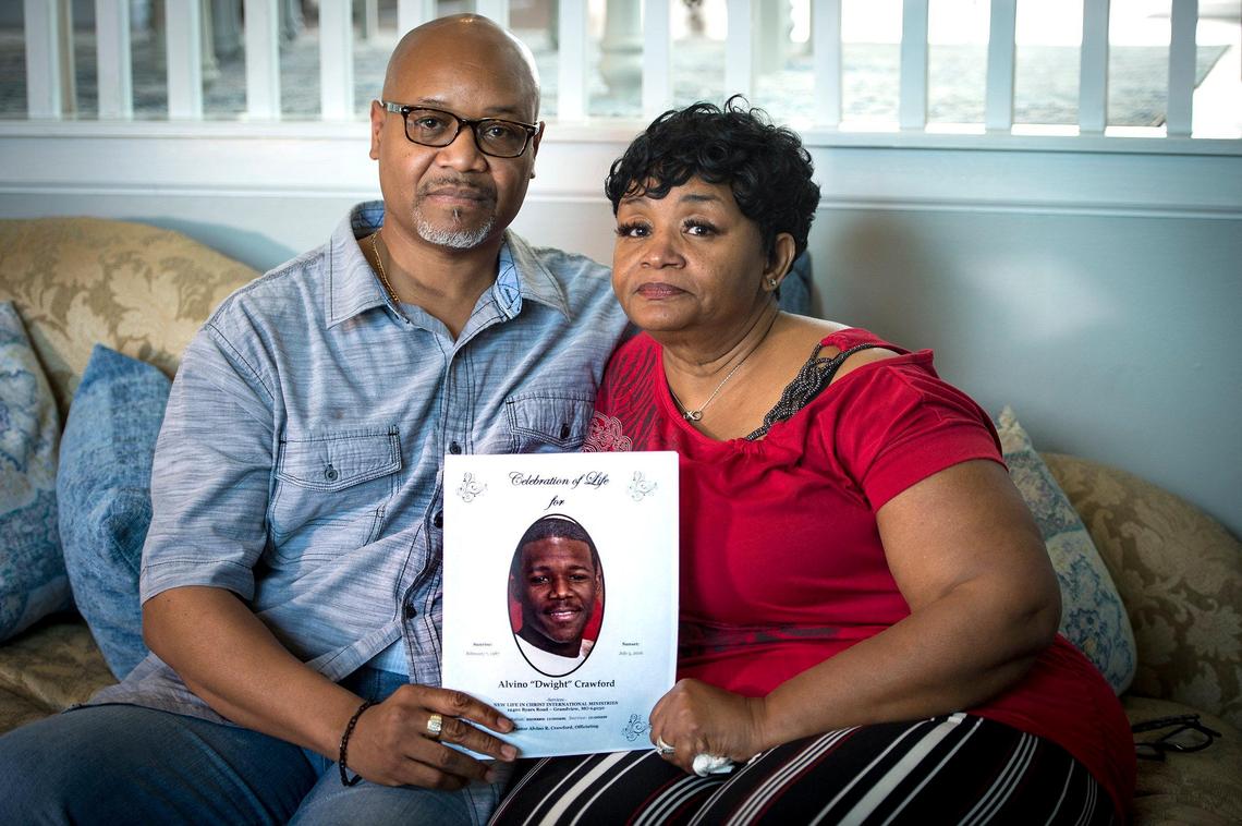 Alvin and Beverly Crawford, the parents of Alvino Dwight Crawford Jr., who was killed in a 2016 shooting, have filed a wrongful death lawsuit against a firearms manufacturer and the gun dealer who allegedly sold the handgun that was used in the shooting.