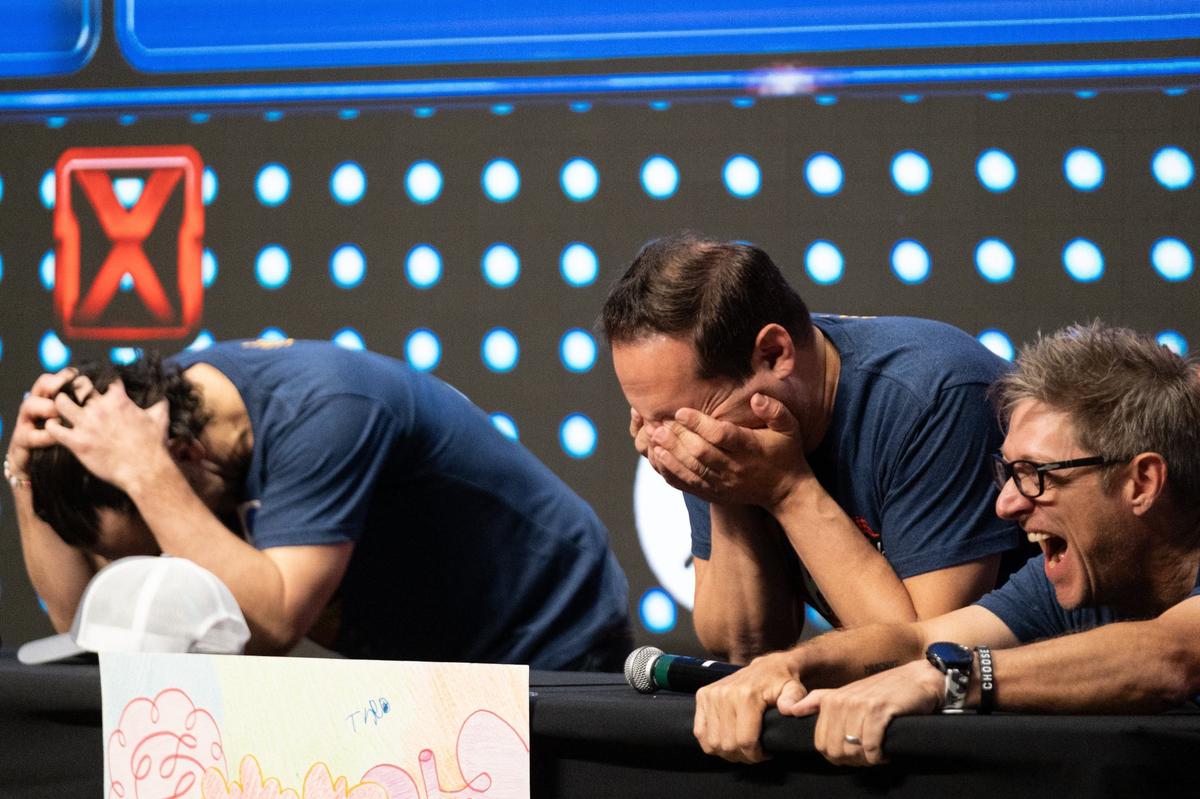 Paul Rudd’s team reacts to Gaten Matarazzo answering “water” for the question “name something hot” during a round of Friendly Feud at the Big Slick Press Conference on Friday, May 31, 2024, at Children’s Mercy Research Institute.