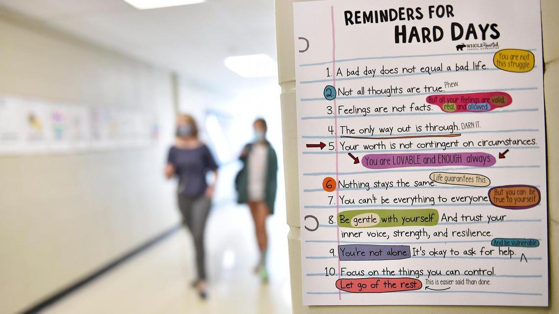 Messages to help students cope are posted around the building at a Kansas City area middle school in 2021.