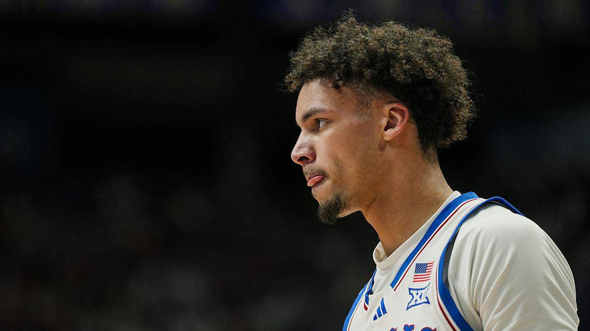 Feb 3, 2025; Lawrence, Kansas, USA; Kansas Jayhawks guard Zeke Mayo (5) reacts during the first half against the Iowa State Cyclones at Allen Fieldhouse. Mandatory Credit: Jay Biggerstaff-Imagn Images