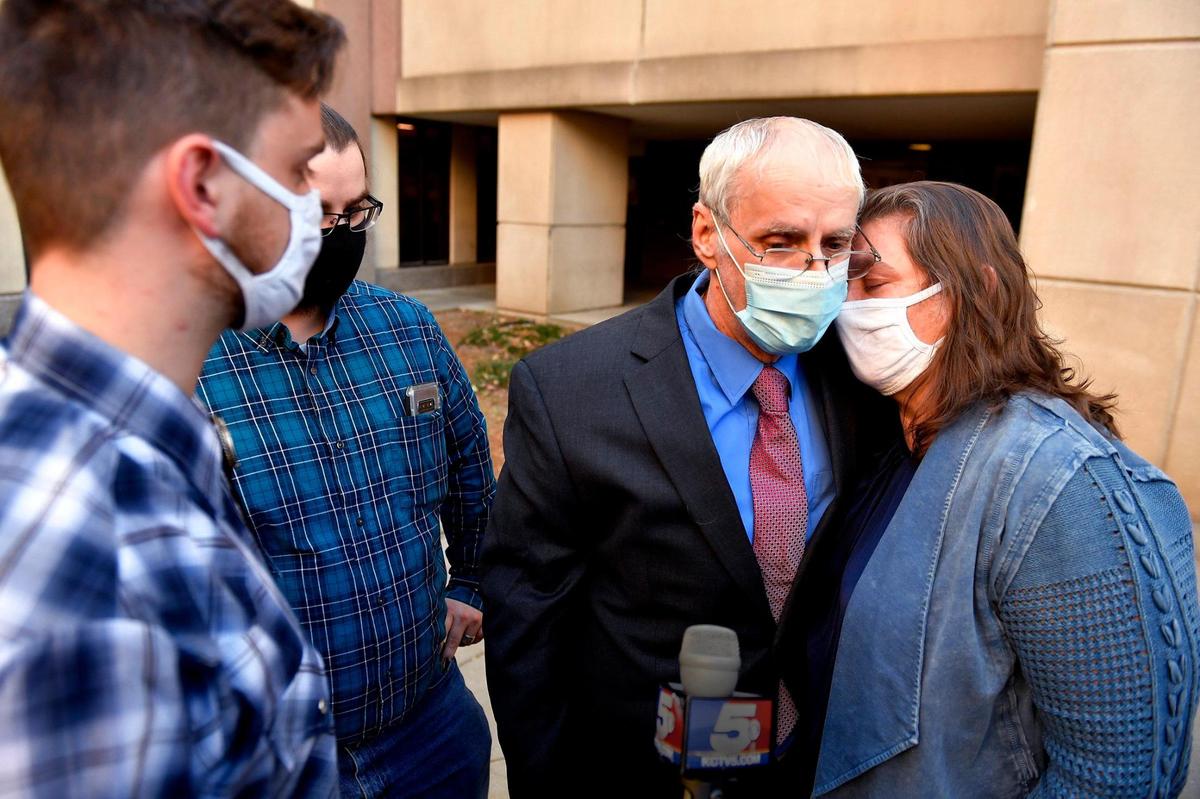 After spending more than 12 years in prison for murder, Olin “Pete” Coones walked out of the Wyandotte County Courthouse and into the arms of his family Thursday evening. After more than 12 years behind bars, Coones left the courthouse a free man. The Wyandotte County District Attorney’s Office moved to drop the charges against Coones, now 63, after the judge found Coones received an unfair trial in the 2008 shooting deaths of Kathleen and Carl Schroll.