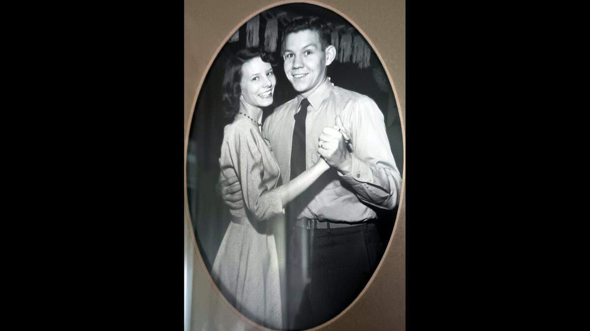 Charles Hammer dances with his wife at a military USO event in 1957. Beware dancing, he suggests, if you want to keep a relationship cool.
