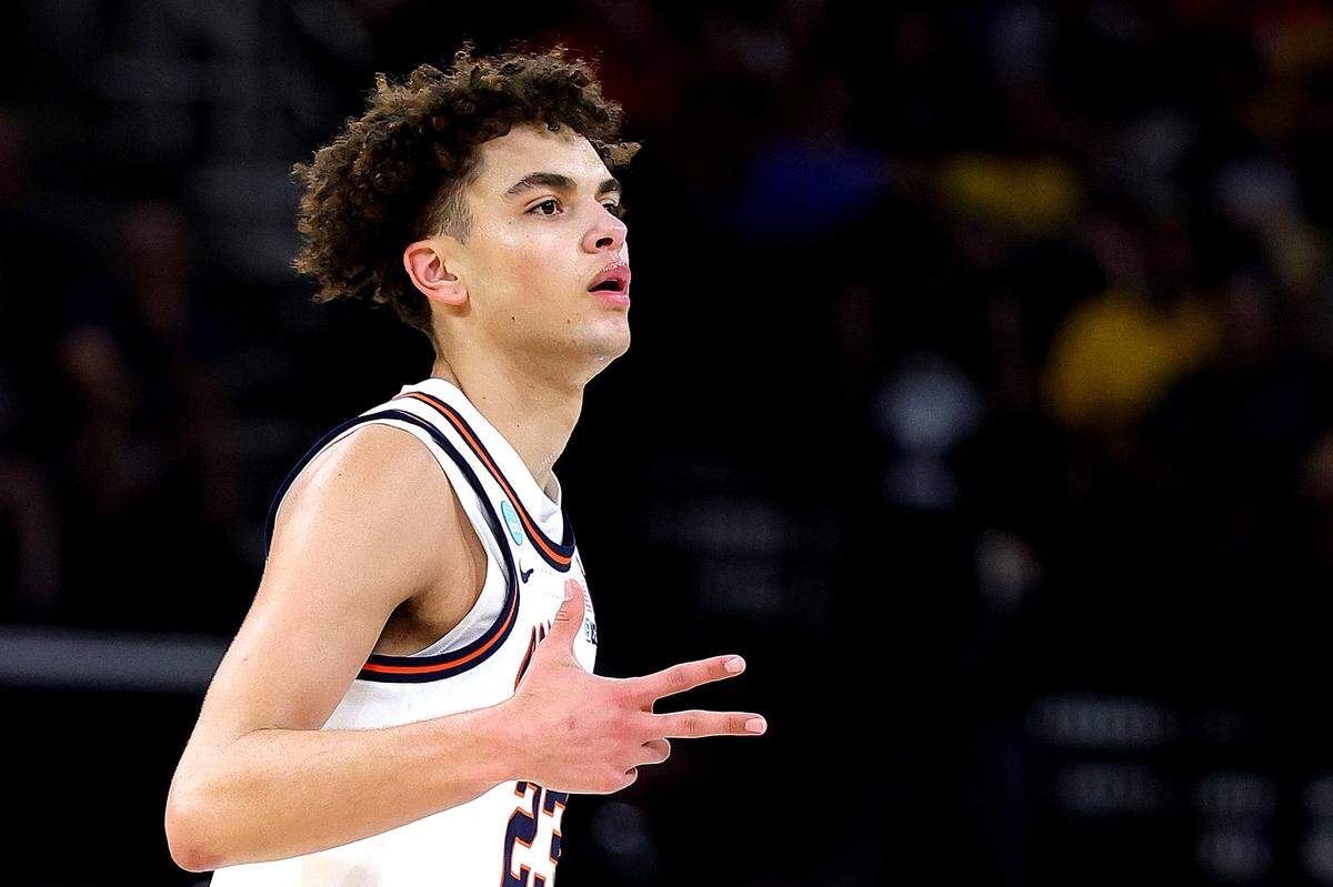 Illinois’ Keaton Wagler signals his made 3-pointer during an NCAA Tournament Elite Eight game against the Iowa Hawkeyes at Toyota Center in Houston on Saturday, March 28, 2026.