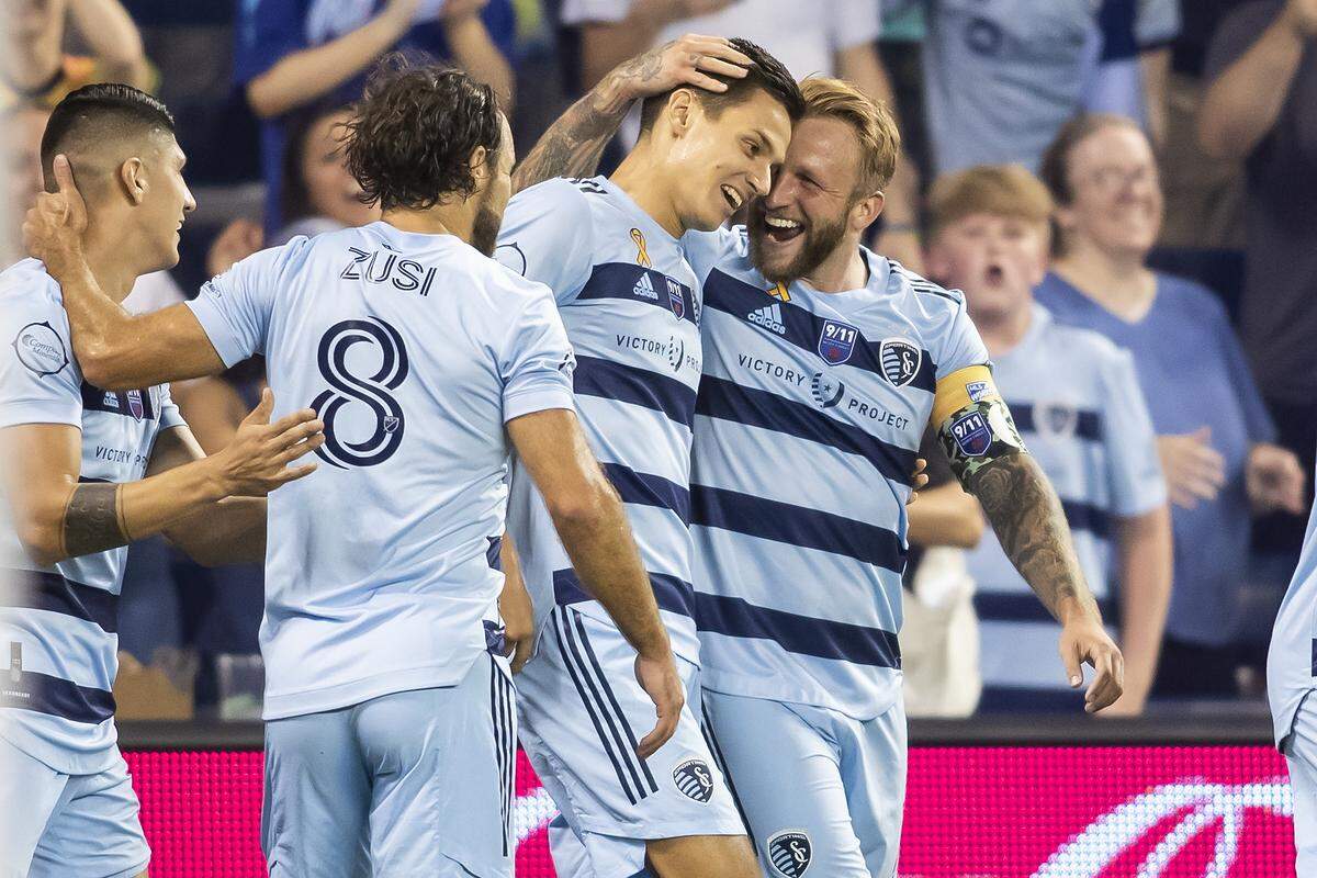 Sporting Kansas City winger Daniel Salloi (center) now has 15 goals this season. He’s looking good in the race for MLS’ annual Golden Boot.