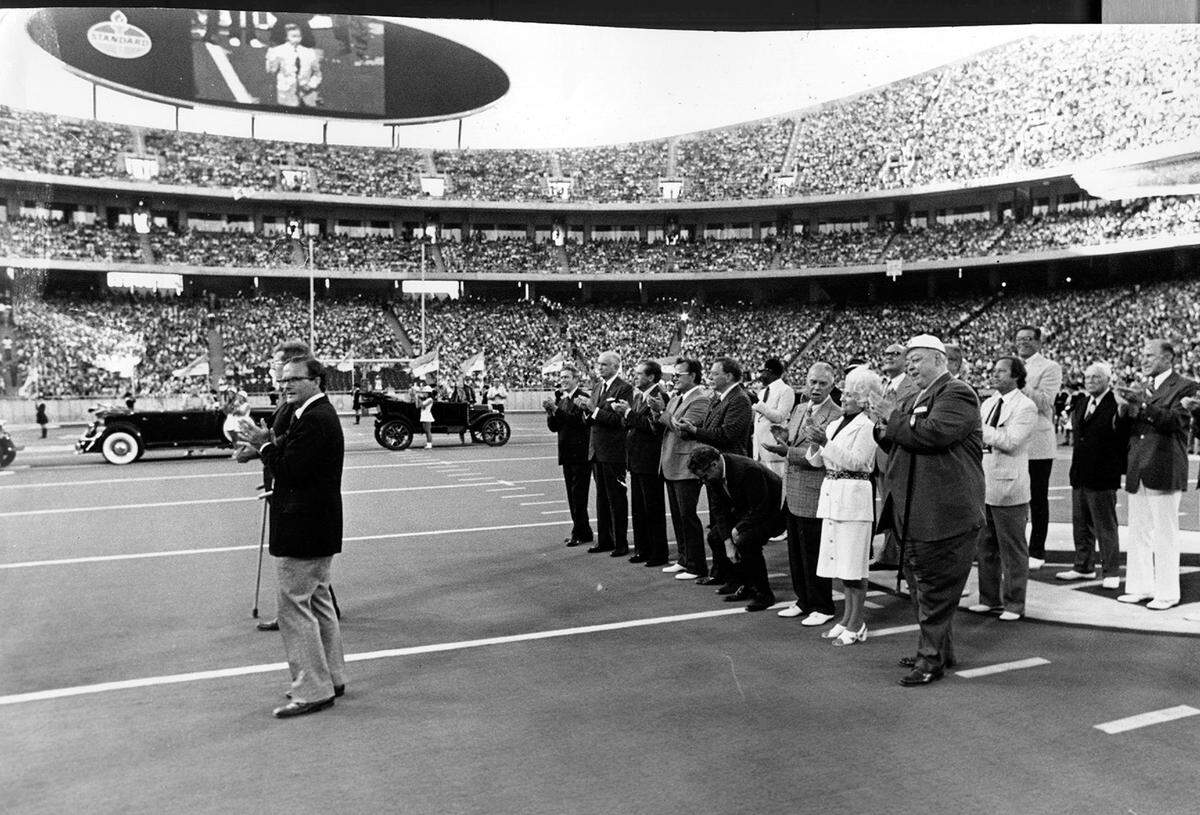 Kansas City Chiefs owner Lamar Hunt (left) and Kansas City Mayor H. Roe Bartle (right, with cane) helped celebrate the opening of Arrowhead Stadium on August 12, 1972.