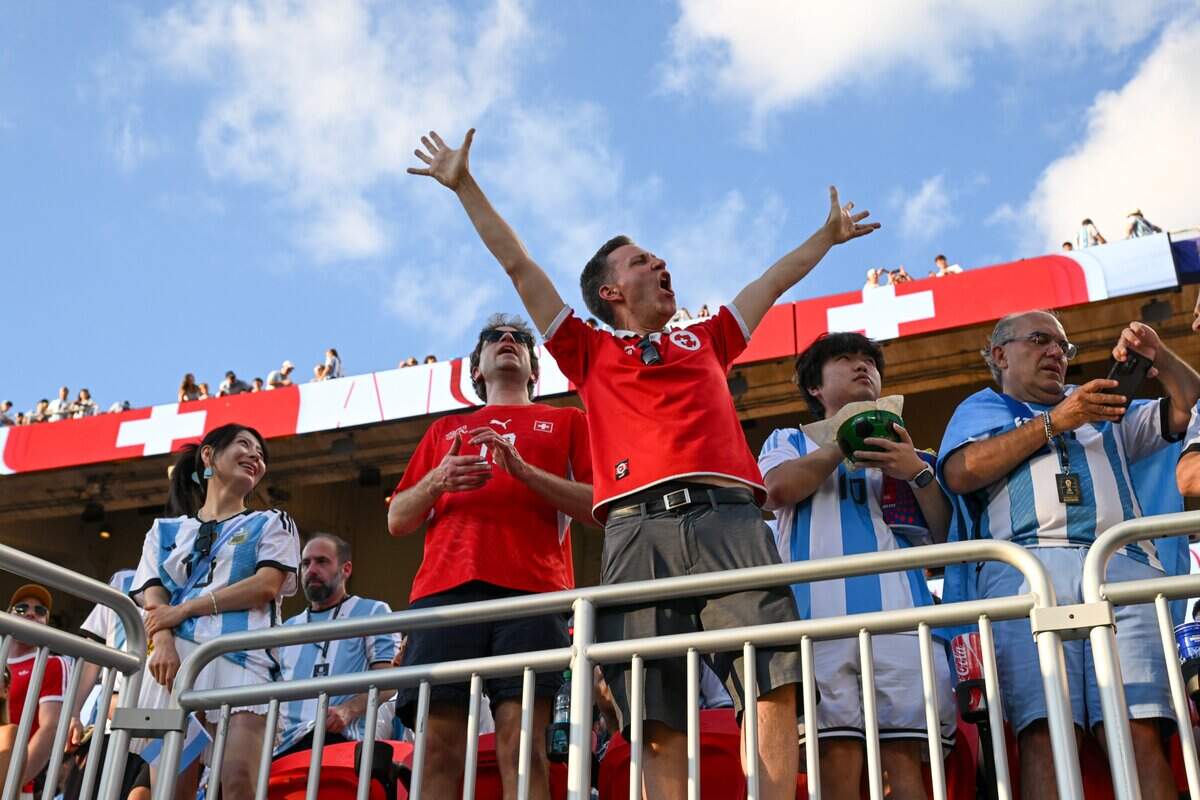 Swiss fans cheer for their national team before the Argentina vs. Switzerland 2026 World Cup Quarterfinal football match at Kansas City (Arrowhead) Stadium in Kansas City on Saturday, July 11, 2026.