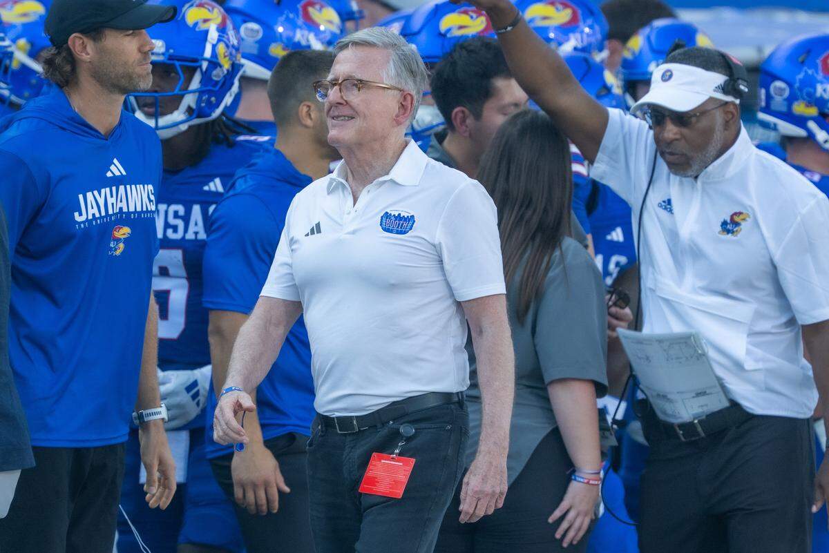 University of Kansas donor David Booth walks the sideline before the start of the Jayhawks game vs. the Fresno State Bulldogs on Saturday, Aug. 23, 2025, at David Booth Kansas Memorial Stadium, in Lawrence.