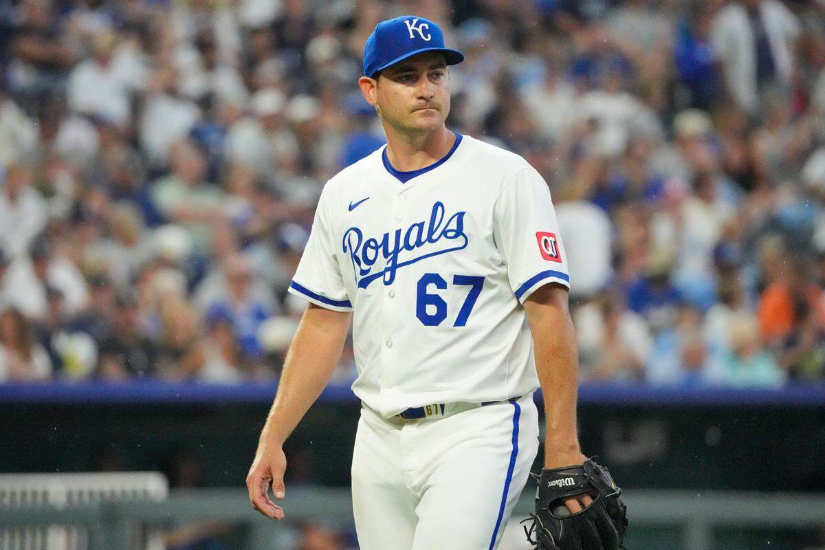 Kansas City Royals starting pitcher Seth Lugo (67) returns to the dugout against the New York Yankees after being replaced in the sixth inning at Kauffman Stadium on June 12, 2025.