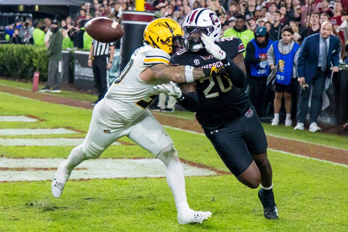 South Carolina Gamecocks tight end Michael Smith somehow made this catch for a touchdown reception despite the defense of Missouri Tigers linebacker Chuck Hicks during a Saturday, Nov. 16, 2024 college football game at Williams-Brice Stadium in Columbia, South Carolina.