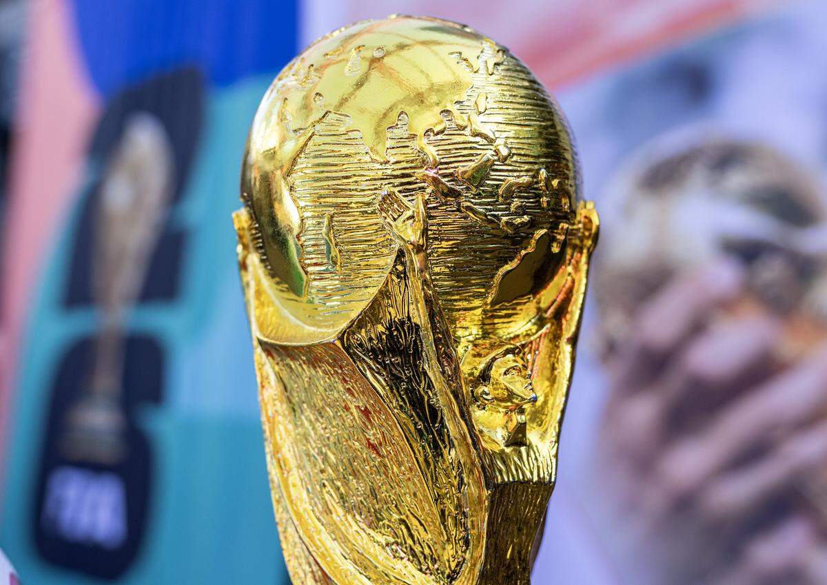 A replica of the FIFA World Cup trophy is displayed during a FIFA World Cup draw watch party at the Power & Light District on Friday, Dec. 5, 2025, in Kansas City.