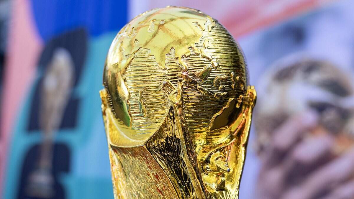 A replica of the FIFA World Cup trophy is displayed during a FIFA World Cup draw watch party at the Power & Light District on Friday, Dec. 5, 2025, in Kansas City.