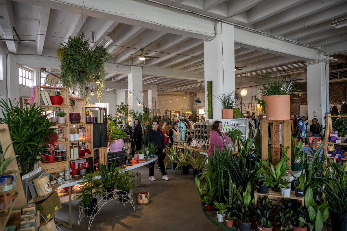 Guests sit at tables while making crafts at the ADHDIY Craft Cafe on Saturday, Feb. 7, 2026, in Kansas City.