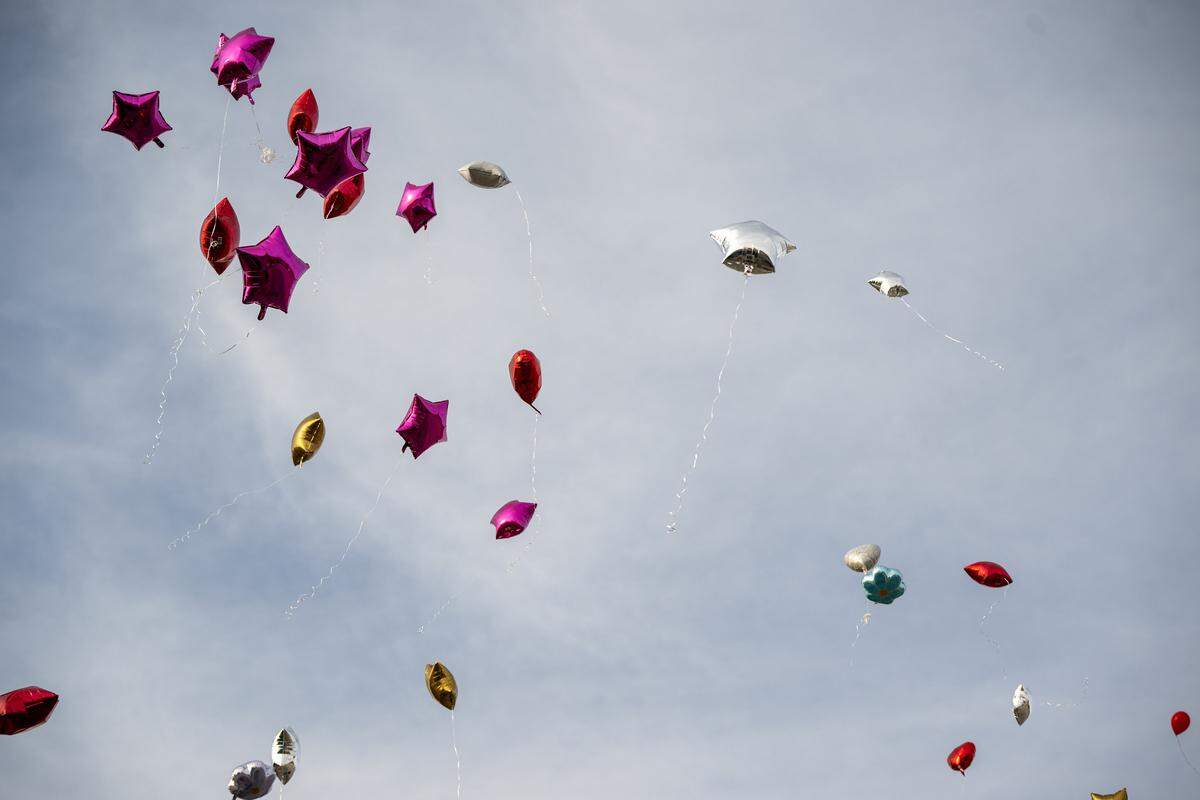 One day after a nightclub shooting left two women dead, a memorial balloon release was held for victim Eboni Silas outside the nightclub, 2801 Southwest Blvd., on Monday, Feb. 16, 2026, in Kansas City. Authorities identified the victims as Eboni Silas, 29, Tishauna Ballard, 23.