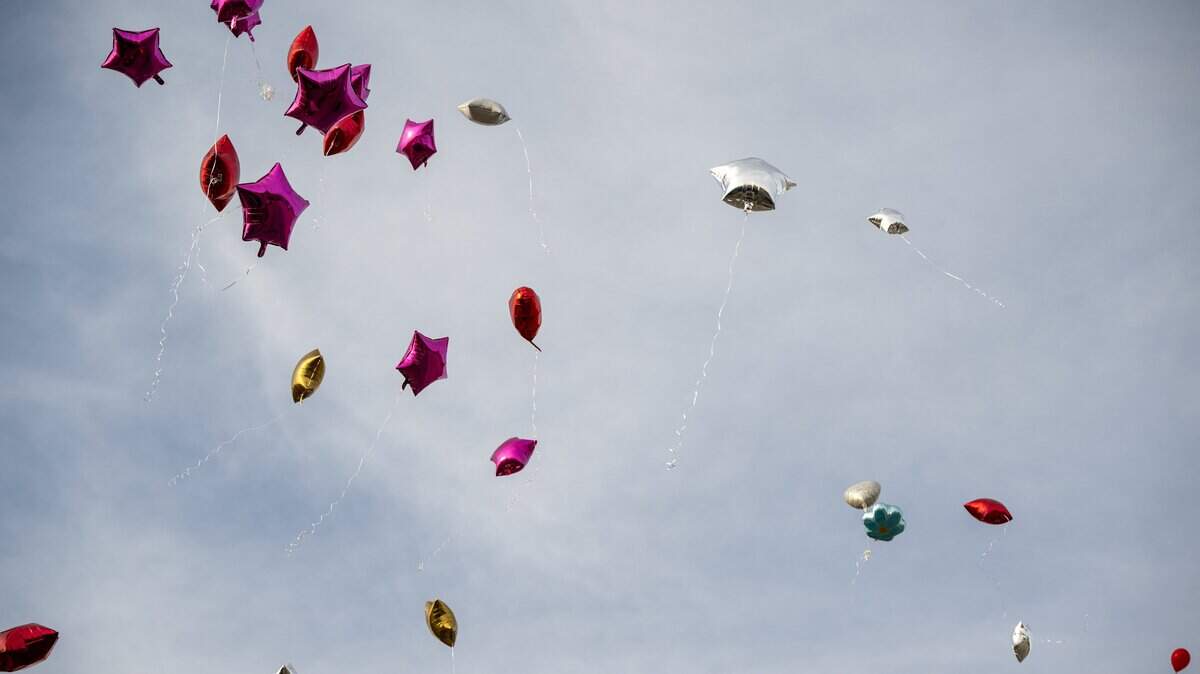 One day after a nightclub shooting left two women dead, a memorial balloon release was held for victim Eboni Silas outside the nightclub, 2801 Southwest Blvd., on Monday, Feb. 16, 2026, in Kansas City. Authorities identified the victims as Eboni Silas, 29, Tishauna Ballard, 23.