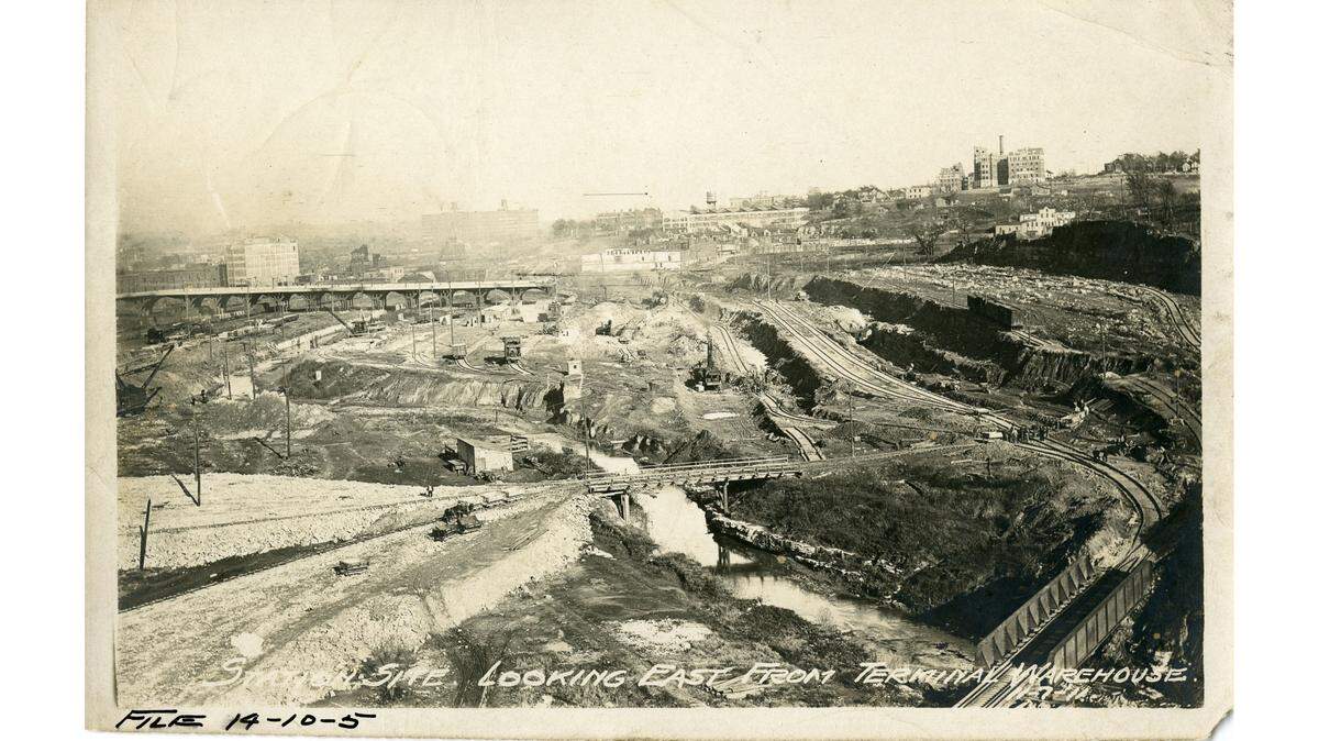 Union Station construction site, looking east from the Terminal Warehouse on Broadway, November 7, 1911. O.K. Creek runs through the middle of the site.